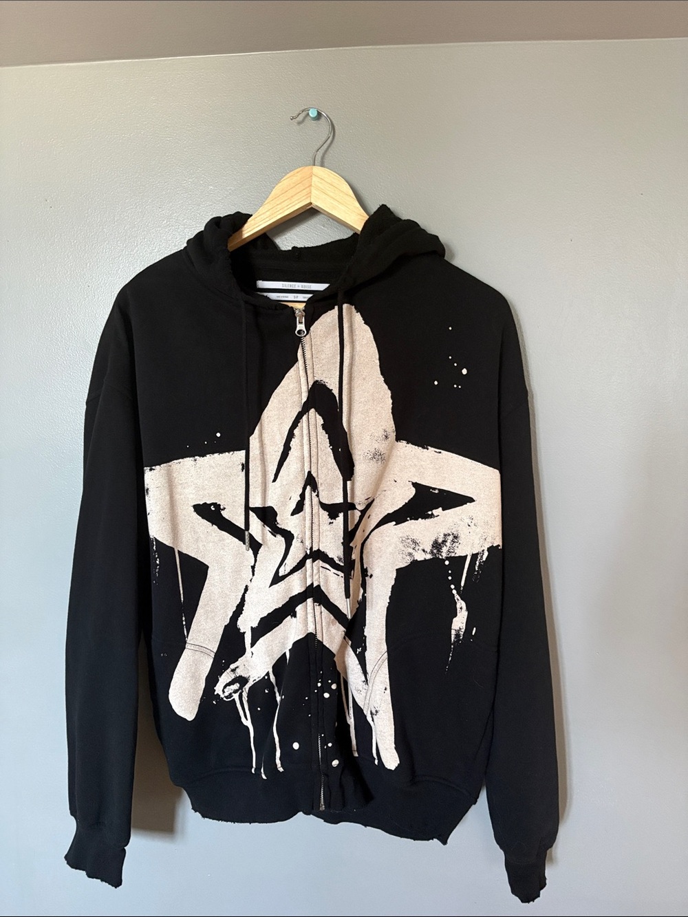 silence + noise Black Zip Hoodie with Cream Star Graphic